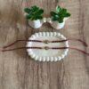 Minimal Peacock Rakhi